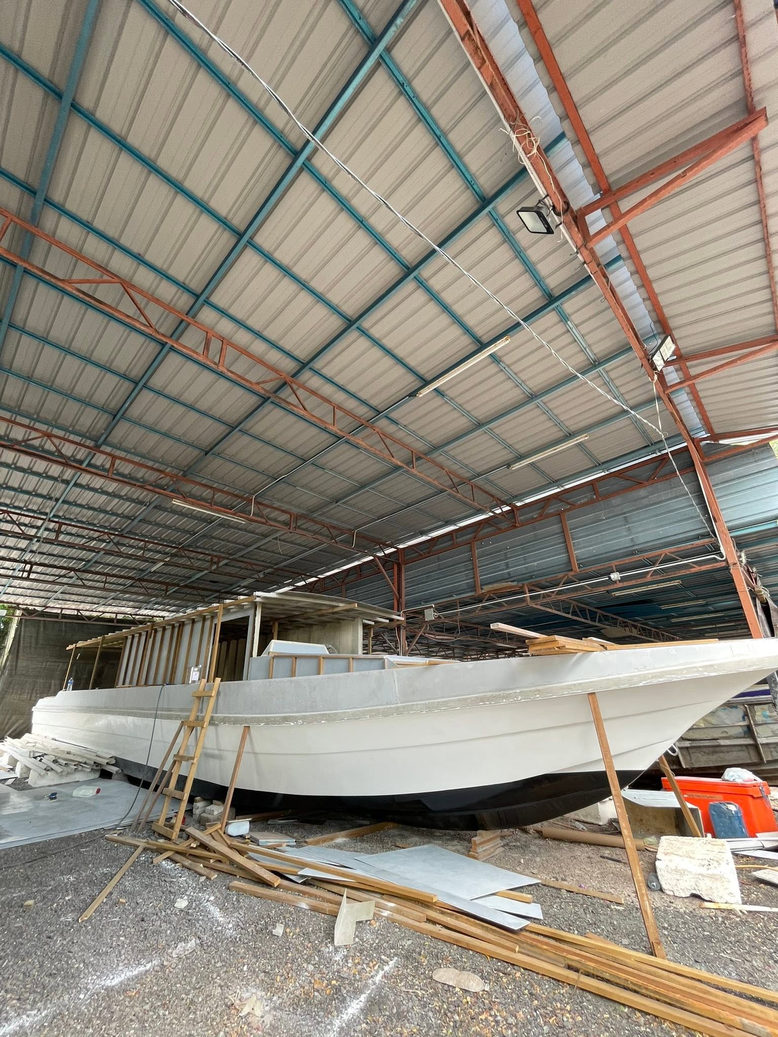 White working vessel with its superstructure under construction